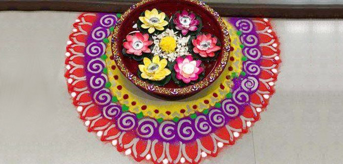 Now you are ready to fill your Rangoli with colourful powder and other chosen material