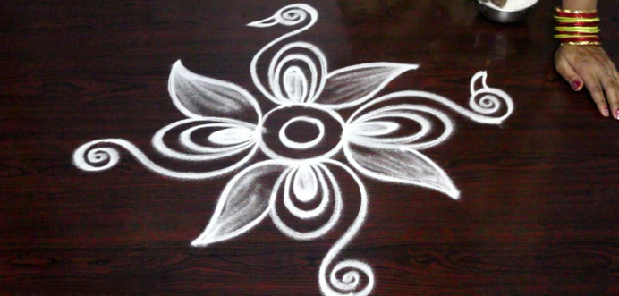 Thicken the complete Rangoli Design Outline with Chalk