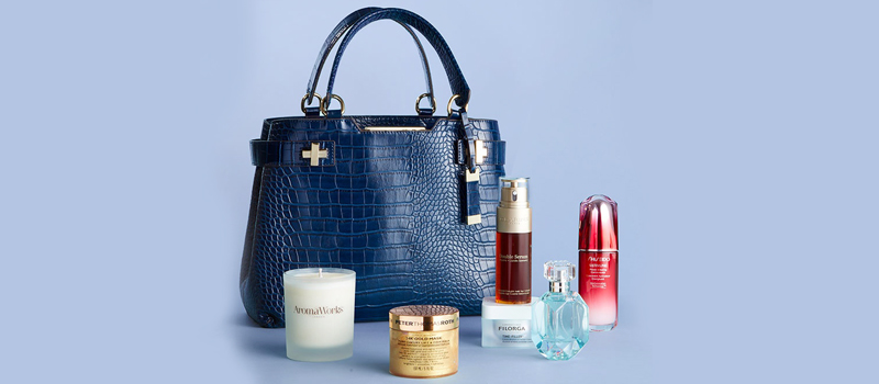 stylish handbag and perfume