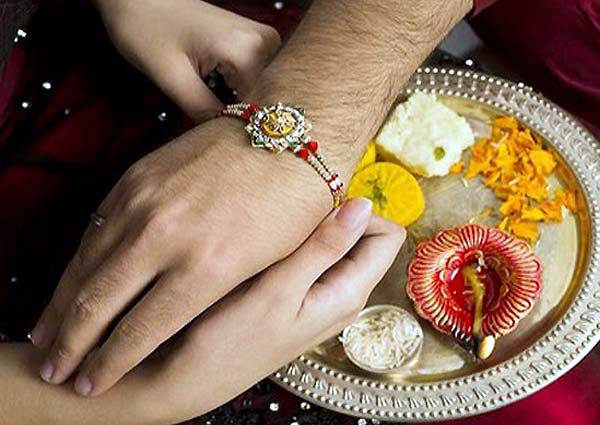 Classical method for tying Rakhi