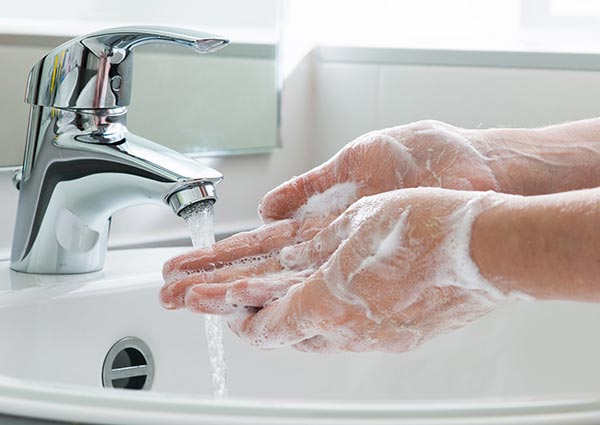 Wash hands with soap and water